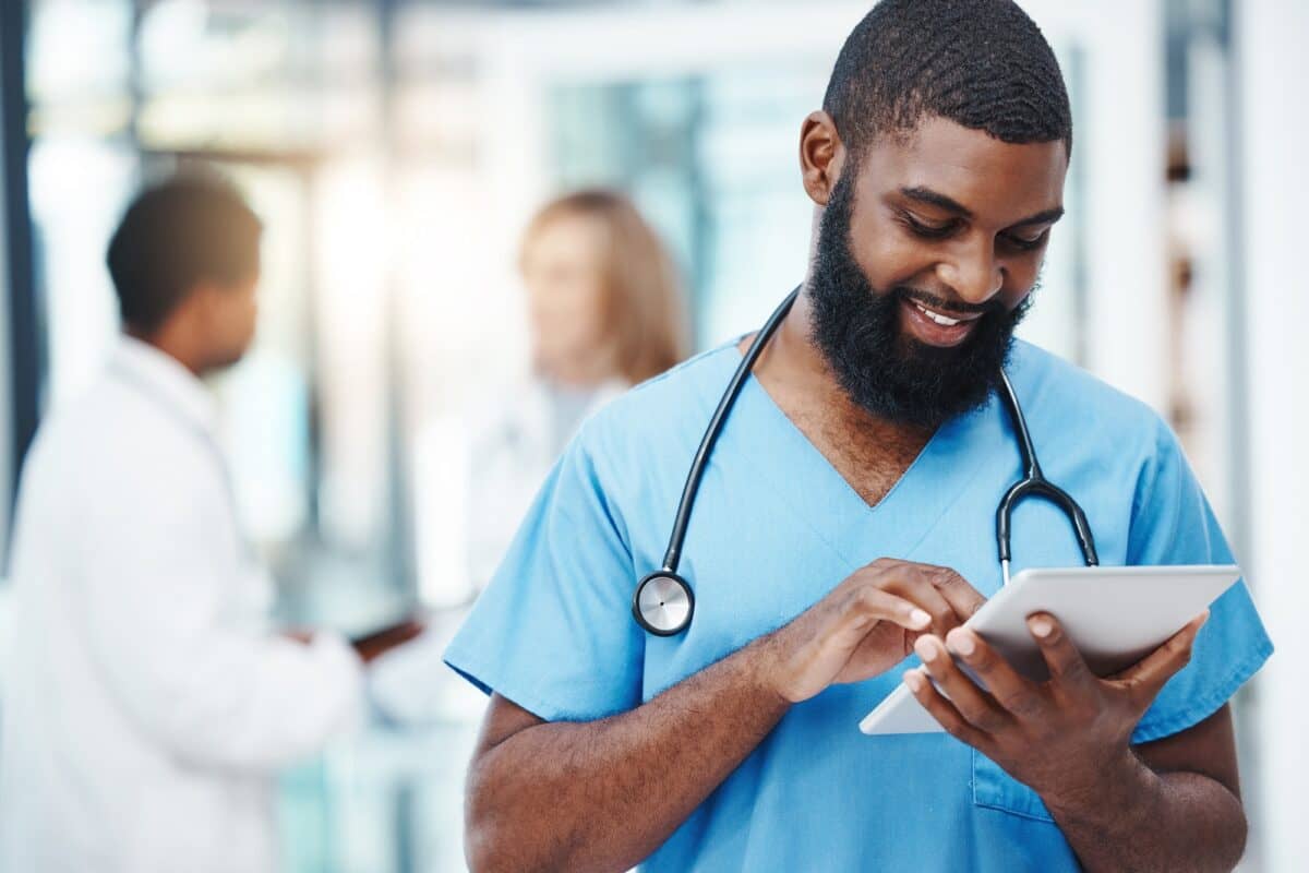 Hospital nurse on tablet