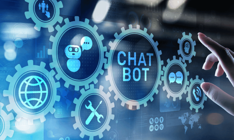 A hand touching digital cogs for an chat bot