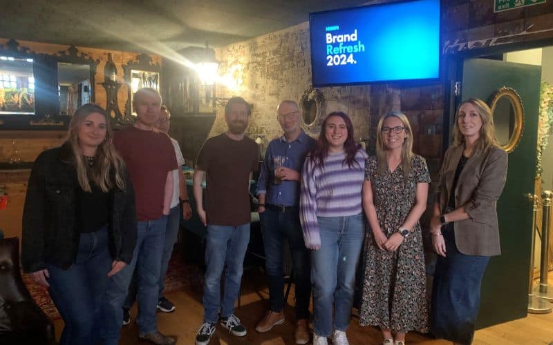 IGNIFI team gather to give feedback on the new brand refresh