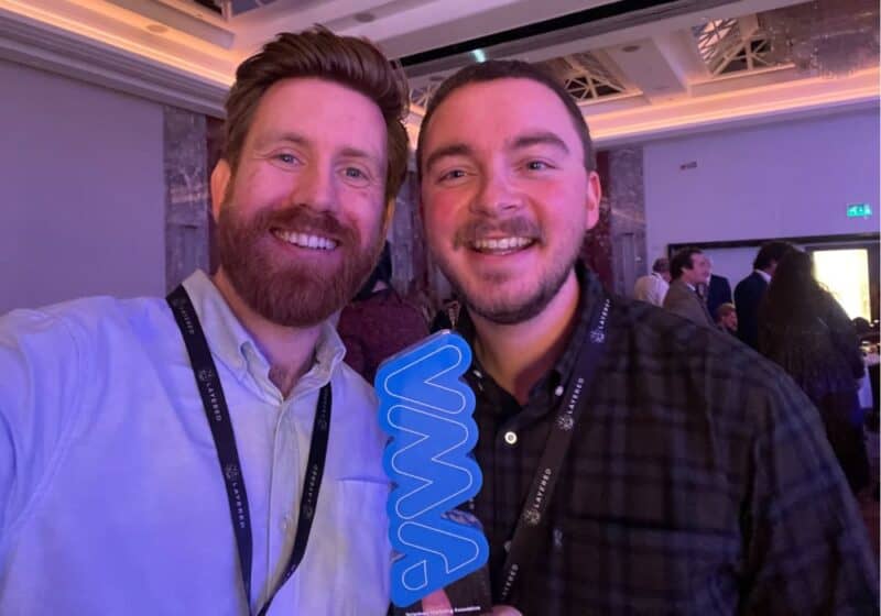 Craig and Liam holding the VMA award