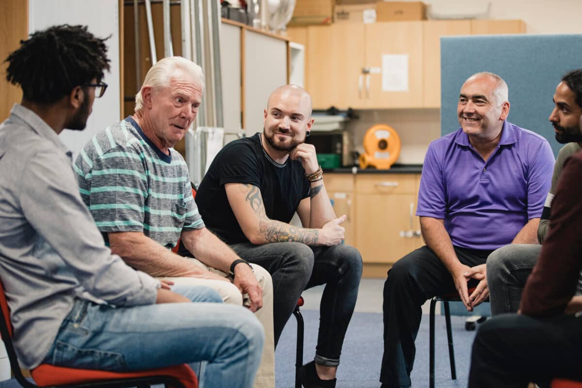 Men sitting in a support group