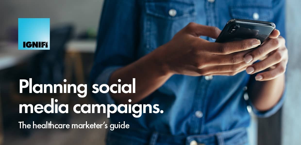 Planning social media campaigns banner with the image of a woman on their phone